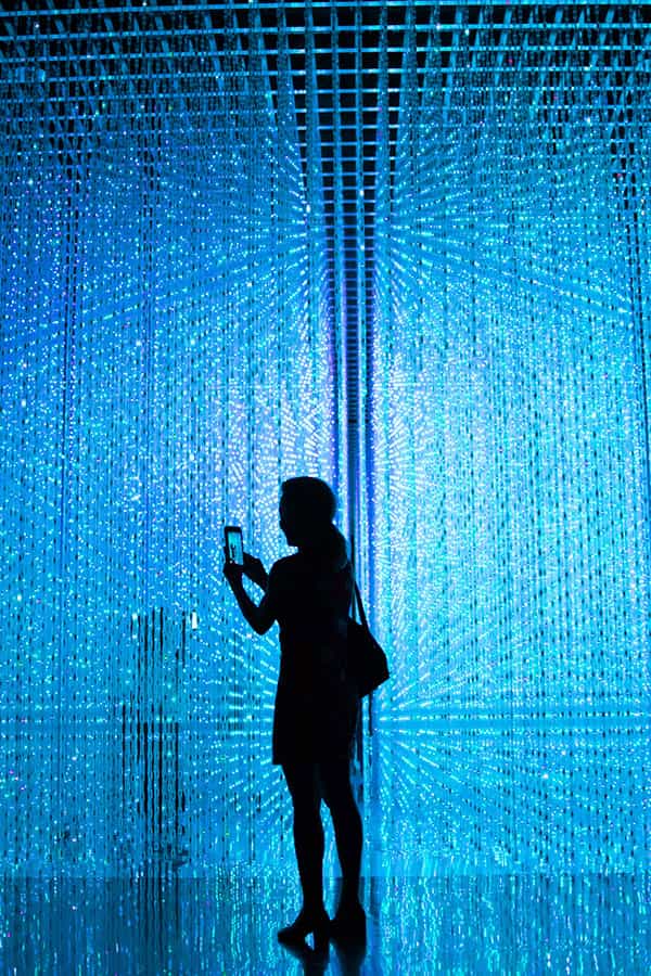 Women taking photo of lights